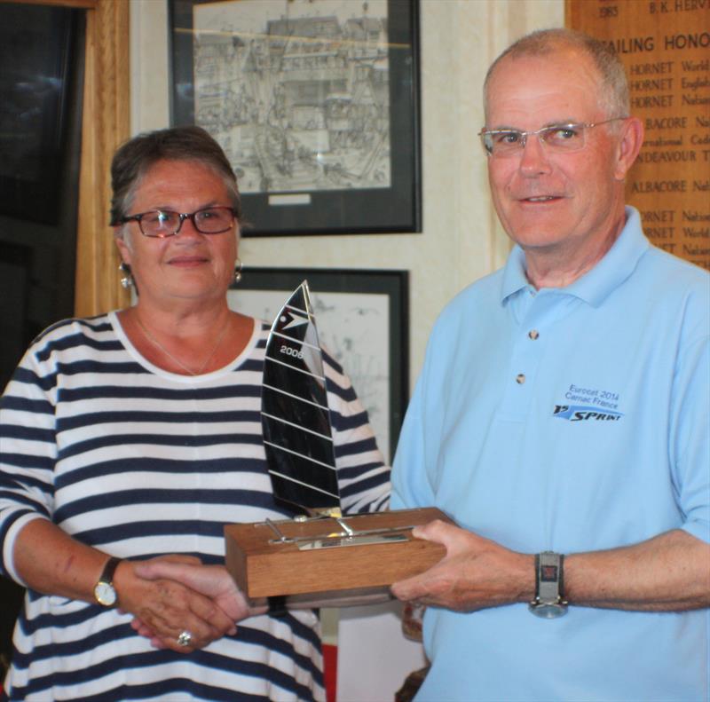 Sissy Dewhirst presents winner Stuart Snell with the 'Nick Dewhirst Trophy' at the Sprint 15 Nationals at Thorpe Bay photo copyright Irina Tretyakova taken at Thorpe Bay Yacht Club and featuring the Dart 15 class