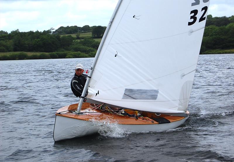 Martin Hughes, in an immaculate Fairey Finn, going fast and having fun on his way to becoming Classic Finn Champion, 2014 photo copyright David Henshall Media taken at Roadford Lake Sailing Club and featuring the Finn class