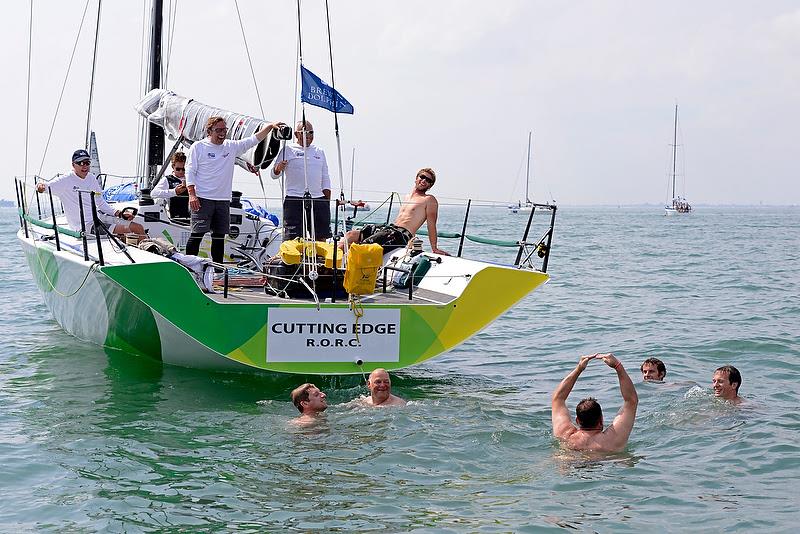 The crew of Cutting Edge enjoy a quick dip on day 4 of the Brewin Dolphin Commodores' Cup photo copyright Rick Tomlinson / RORC taken at Royal Ocean Racing Club and featuring the IRC class