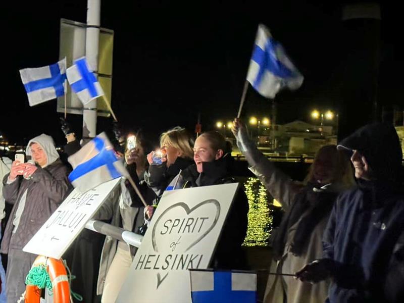 Team of Spirit of Helsinki FR (71) were greeted by cheering Finnish family and fans on the Trinity Landing pontoon, Cowes photo copyright Aïda Valceanu/ OGR2023 taken at  and featuring the Ocean Globe Race class